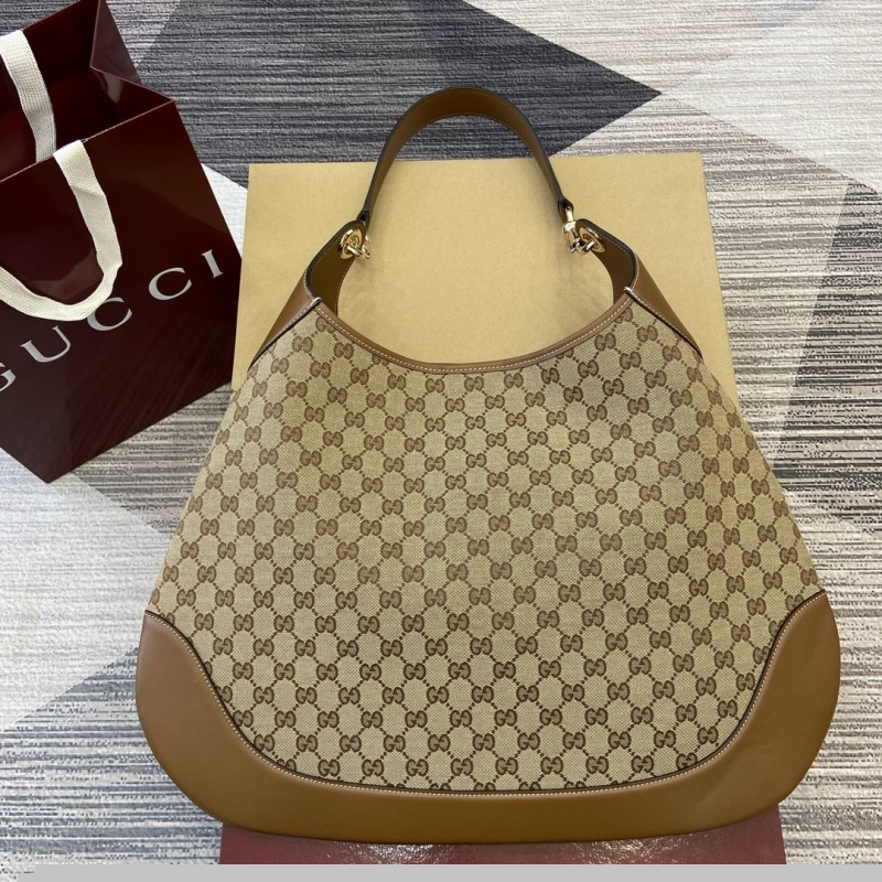 G*u*i top handle bags